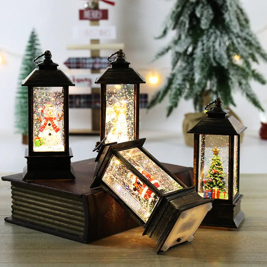 Set of decorative lanterns with Christmas scenes inside on a wooden surface.
